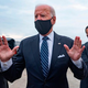 Joe Biden speaking to the press while gesticulating with his hands